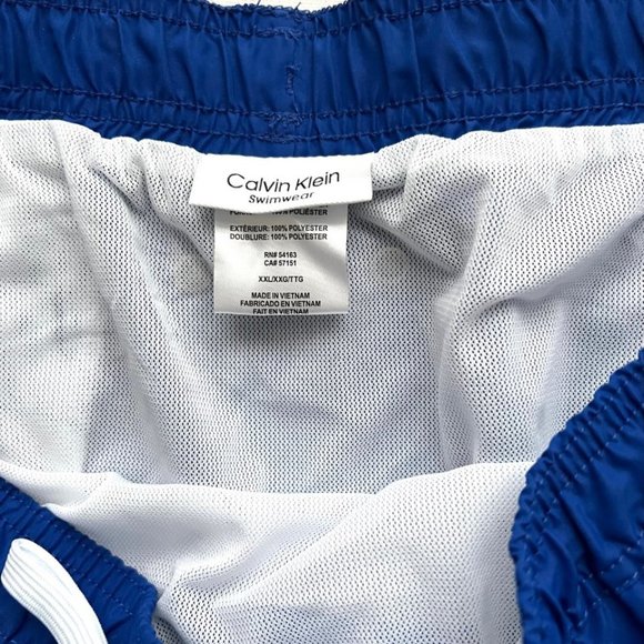 Calvin Klein CK  Logo Badge Solid Swim Trunk Blue - Picture 3 of 4
